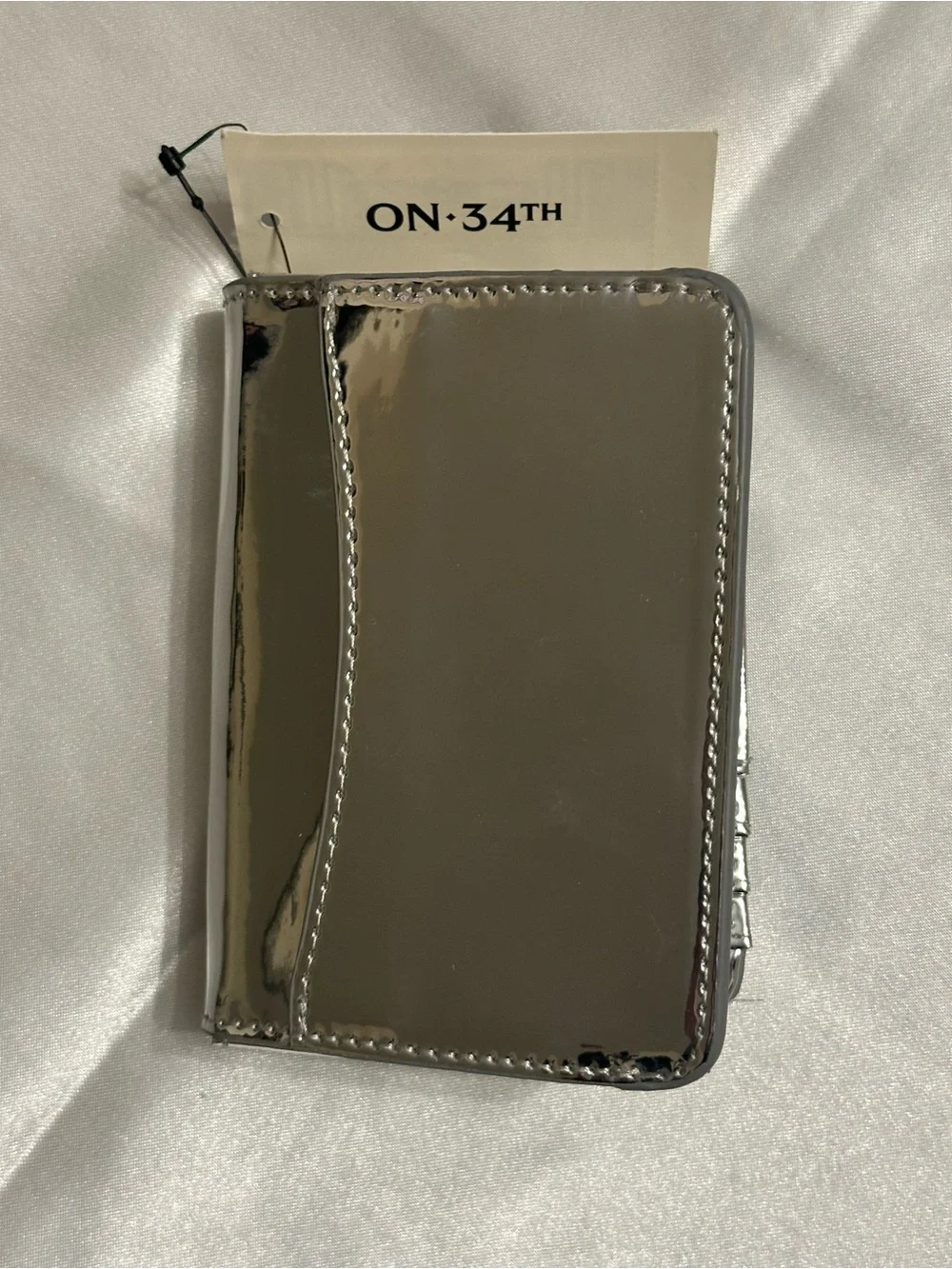 On 34th NWT Joesil Metallic Bi-fold Wallet-Mirror Silver